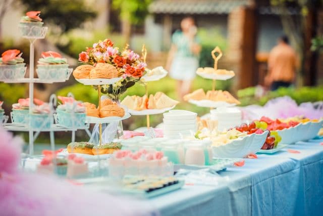 Dessert table piled with sweets